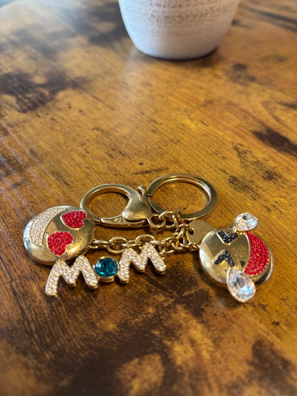 Swarovski Gold-tone 'MOM' Crystal Charm Keychain with Red and Blue Accents